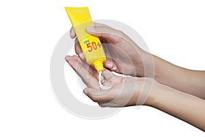 Woman applying sunscreen on her hand isolate on white background