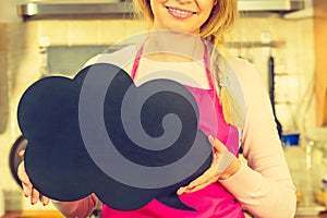 Woman in apron with speech bubble