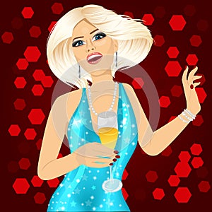 Woman in aqua sparkling dress holding a champagne glass