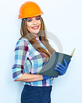 Woman architect hold open book. Smiling girl portrait against w