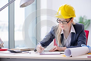 Woman architect working on the project