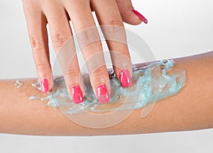 Woman arm with skin gel