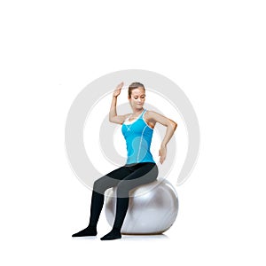 woman, arms or exercise ball in studio mockup space for workout, wellness or mobility for balance. Female athlete