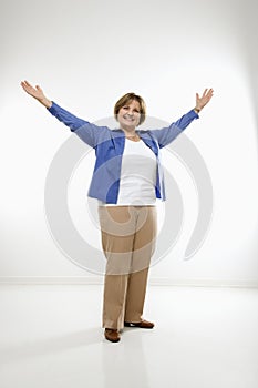 Woman with arms outstretched.