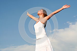 Woman with arms wide open