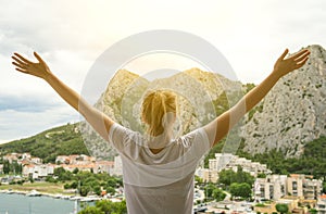 Woman with arms wide open. photo