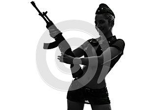 woman in army uniform holding kalachnikov silhouette