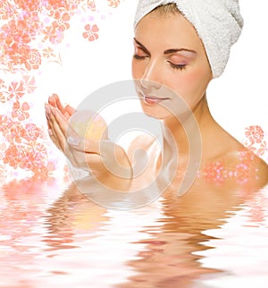 Woman with aroma bath ball