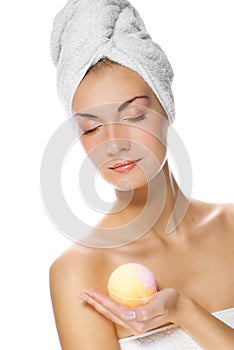 Woman with aroma bath ball