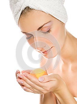 Woman with aroma bath ball