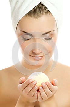 Woman with aroma bath ball