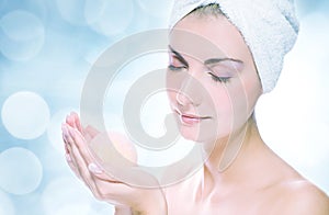 Woman with aroma bath ball