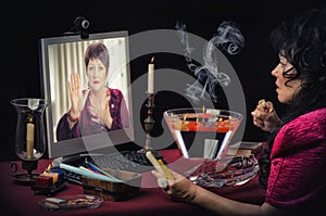 Woman asks to online psychic for hand prediction photo