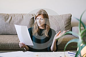 Woman astrologist conducts a consultation at home.