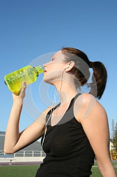 Woman Athlete Drinking