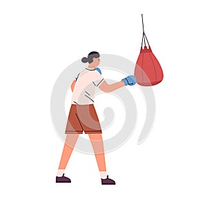 Woman athlete punching boxing bag. Female boxer training, hitting and beating punchball with fist in gloves. Strength