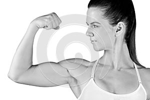 Woman athlete showing biceps