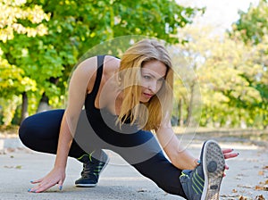 Woman athlete warming up