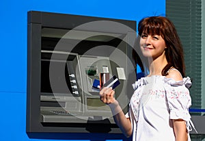 Woman and atm