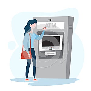 Woman at the ATM. Withdraw cash from machine