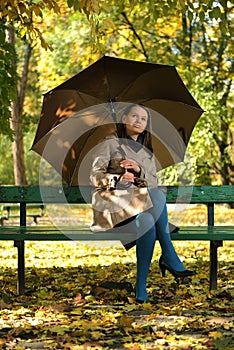 Woman in autumn park