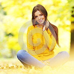 Woman in autumn park