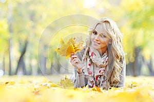 Woman in autumn park