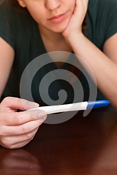 Woman Awaiting Results of Home Pregnancy Test