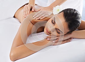 Woman, back massage and body treatment for healing, wellness and muscle therapy for bodycare. Female person, masseuse