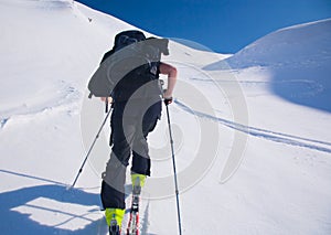 Woman backcountry ski touring