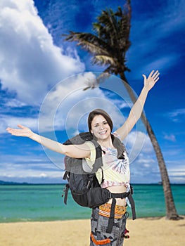 Woman Backpacker, beach at tropical beach