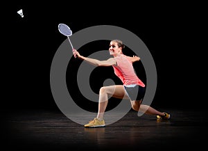 Woman badminton player on black version