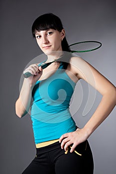 Woman with badminton racket