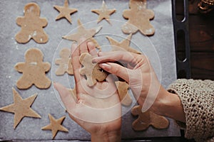 Woman baking christmas gingerbread cookies