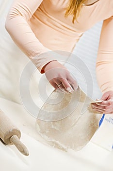 Woman Baking Pizza