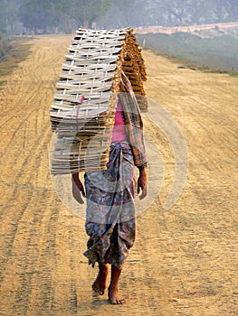 Woman balancing materials