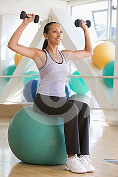 Woman Balancing On Swiss Ball