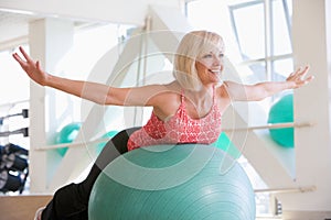 Woman Balancing On Swiss Ball