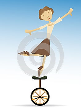 Woman balancing on tippy toes on unicycle photo