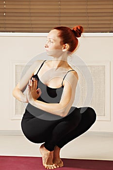 Woman balancing on the tips of toes