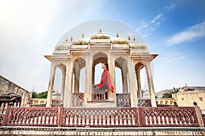 Woman on balcony in Palace of Rajasthan