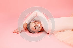 Woman in ballet outfit indoors