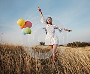 woman balloon girl outdoor fun happy lifestyle running happiness nature summer vitality healthy carefree