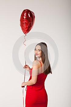 Woman with balloon in Valentine Day