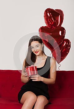 Woman with balloons in Valentine Day