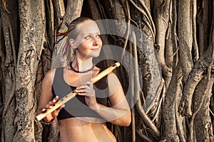 Woman with bamboo flute