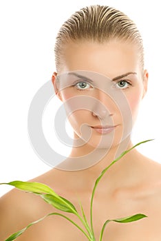 Woman with a bamboo plant