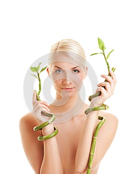 Woman with bamboo plant