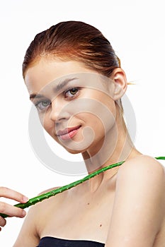 woman with bare shoulders aloe cosmetics spa treatments