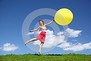 Woman barely touching earth flight away on balloon photo